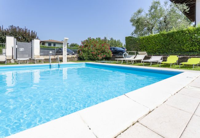 Apartment in Moniga del Garda - La Casetta di Viola